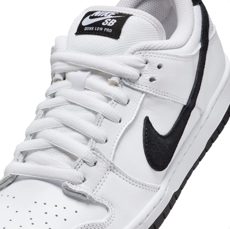 Nike SB Dunk Low Pro Sneakers - White with Black Swooshes