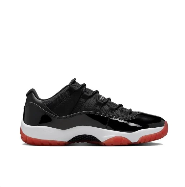 Air Jordan 11 Low Sneakers - Black & White with Red Outsoles