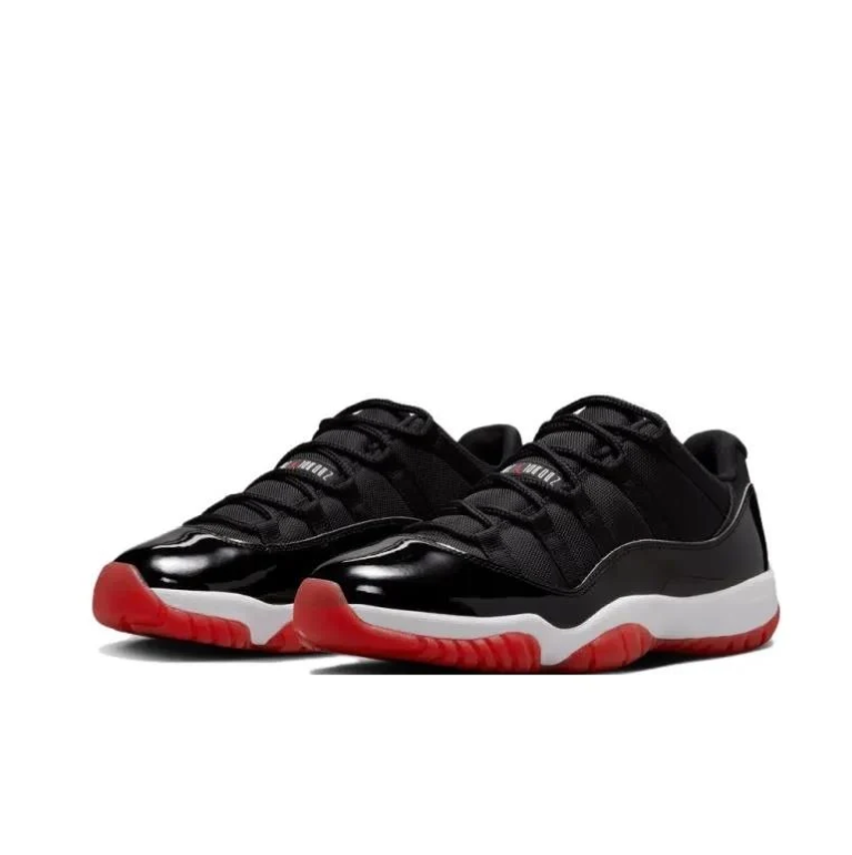 Air Jordan 11 Low Sneakers - Black & White with Red Outsoles