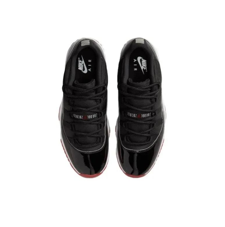 Air Jordan 11 Low Sneakers - Black & White with Red Outsoles