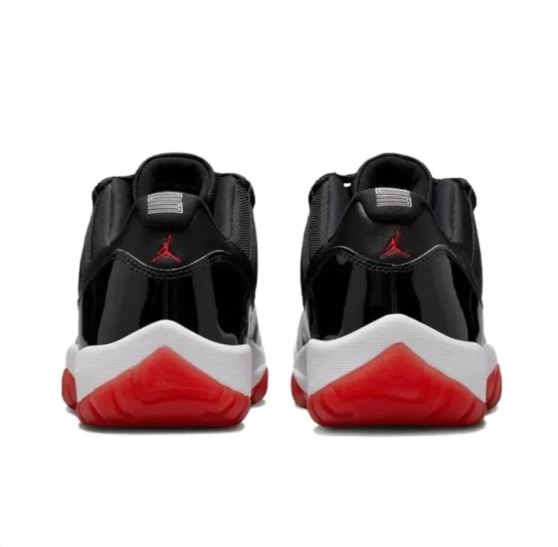Air Jordan 11 Low Sneakers - Black & White with Red Outsoles